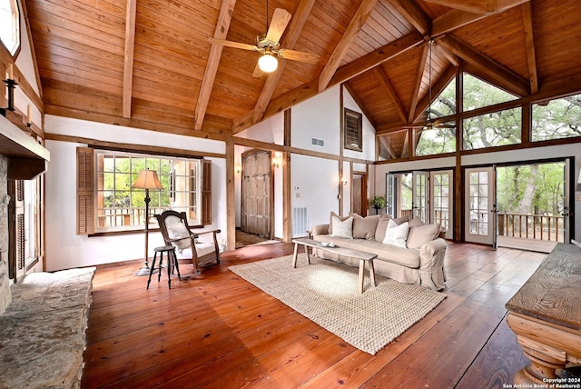 living room with beam ceiling, hardwood / wood-style floors, wooden ceiling, and high vaulted ceiling