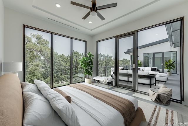 bedroom with french doors and ceiling fan