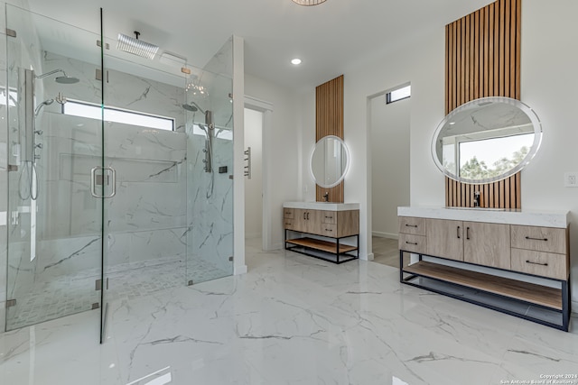 bathroom featuring vanity, an enclosed shower, and tile patterned flooring