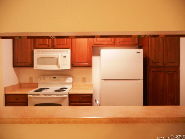 kitchen with white appliances