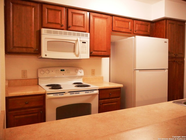 kitchen featuring white appliances