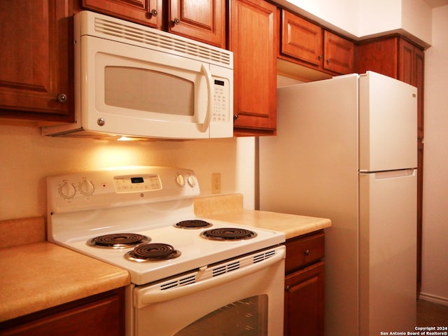 kitchen featuring white appliances