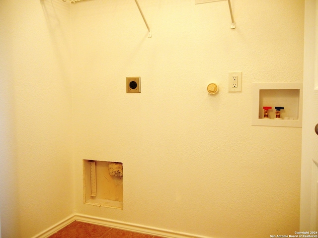 laundry area featuring electric dryer hookup and washer hookup