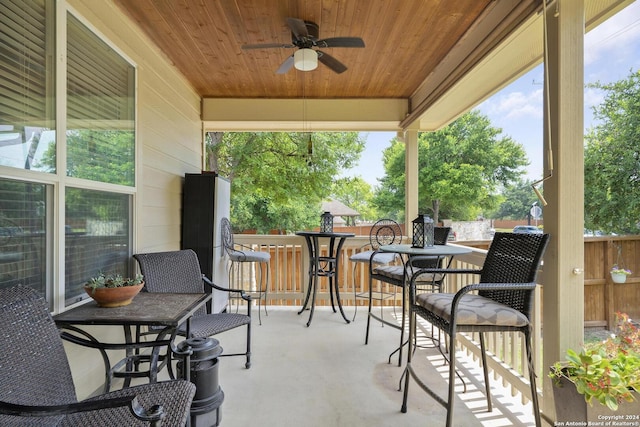 view of patio featuring ceiling fan