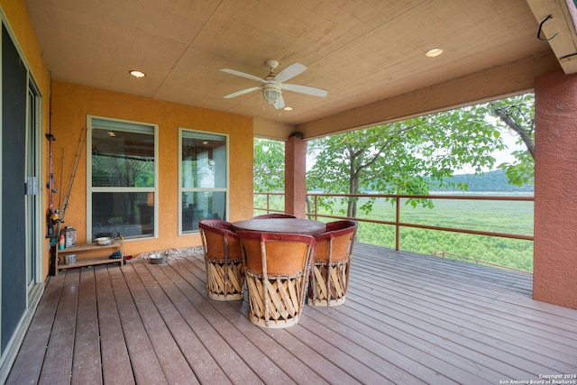 wooden terrace with ceiling fan