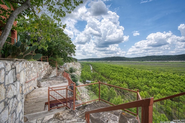 696 Faurie Rd, Lakehills, TX 78063 - view of yard featuring a deck, a view of rural / pastoral area, and agricultural area