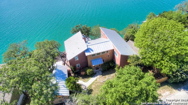 696 Faurie Rd, Lakehills, TX 78063 - view from above of property featuring a large body of water