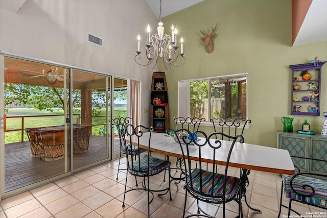 696 Faurie Rd, Lakehills, TX 78063 - dining room with high vaulted ceiling, tile patterned floors, a chandelier, and ceiling fan