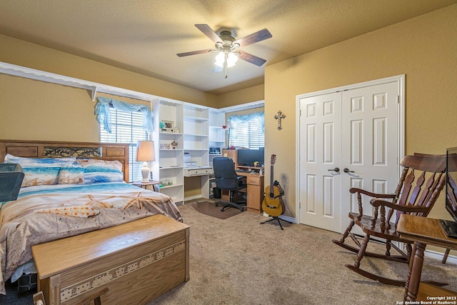 217 Meadowlark Ln, Mcqueeney, TX 78123 - carpeted bedroom featuring ceiling fan and a closet
