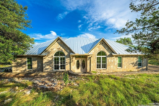 view of front of house featuring solar panels