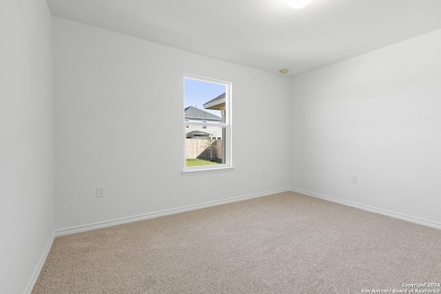 empty room with carpet floors