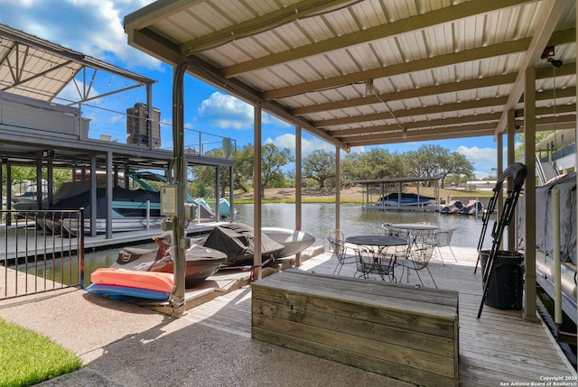 view of dock featuring a water view and boat lift