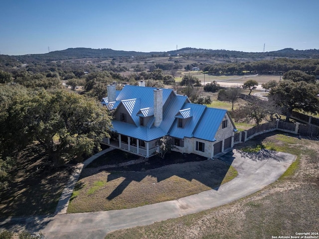 drone / aerial view featuring a mountain view