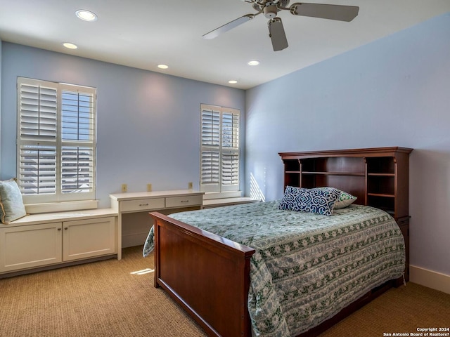 bedroom with recessed lighting, baseboards, a ceiling fan, and light colored carpet