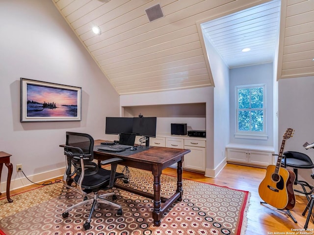 office area with lofted ceiling, light wood-style flooring, wood ceiling, and baseboards