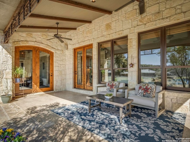 view of patio with a ceiling fan and french doors