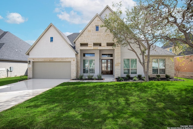 view of front of home with a front lawn and french doors