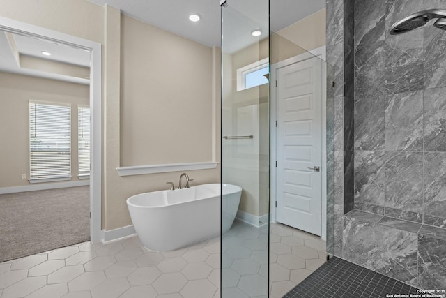 bathroom with baseboards, a soaking tub, recessed lighting, tile patterned flooring, and walk in shower