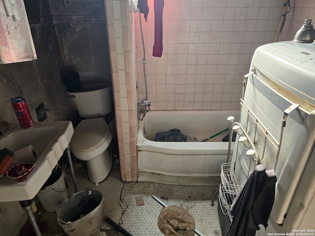 bathroom with tile patterned floors, toilet, and sink