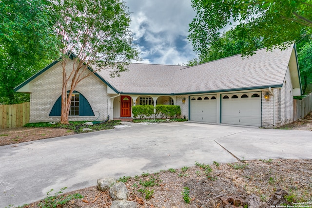 ranch-style home with a garage