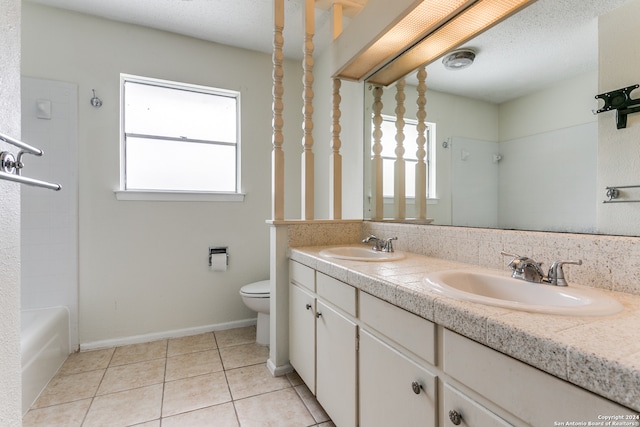 full bathroom with tile patterned flooring, a textured ceiling, double vanity, shower / bath combination, and toilet