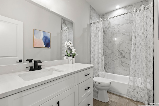 full bathroom featuring vanity, toilet, and shower / bath combo