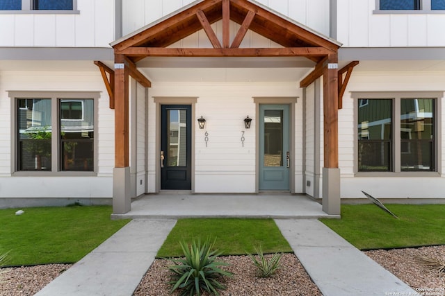 property entrance with board and batten siding