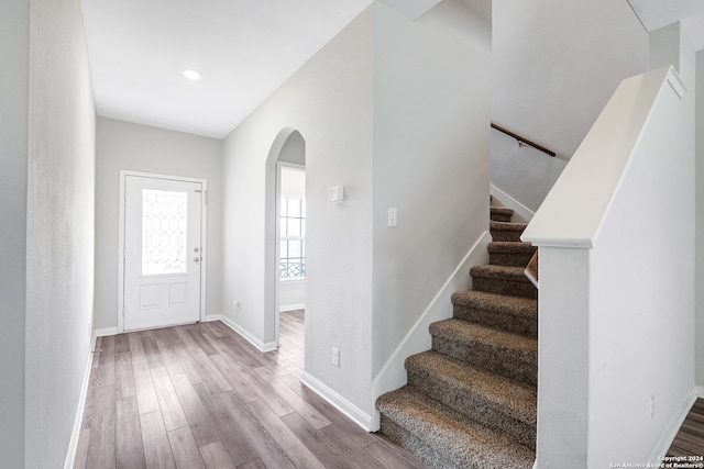 entryway with wood-type flooring