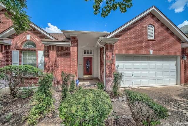 view of front of property featuring a garage