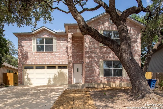 view of front of property featuring a garage