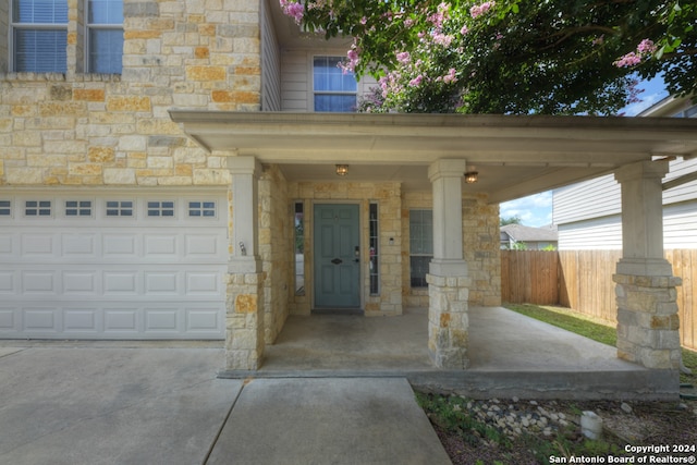 property entrance featuring a garage