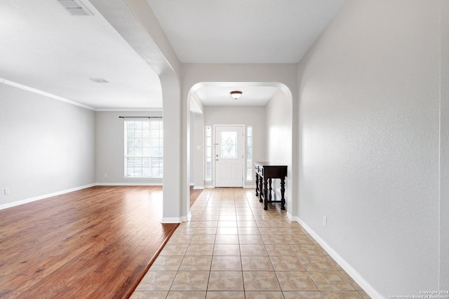 entrance foyer with light hardwood / wood-style flooring