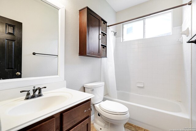 full bathroom with shower / tub combination, vanity, and toilet