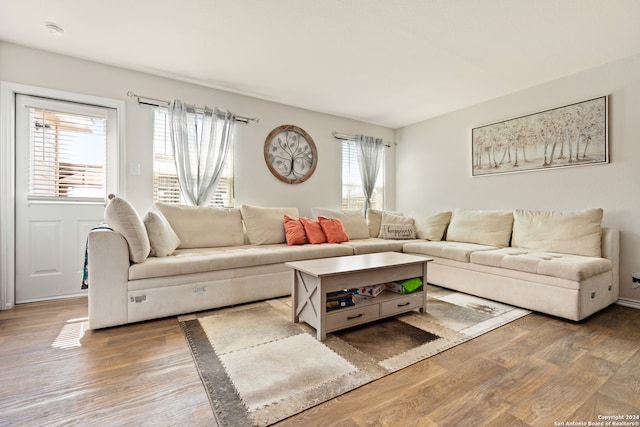 living room with light hardwood / wood-style floors