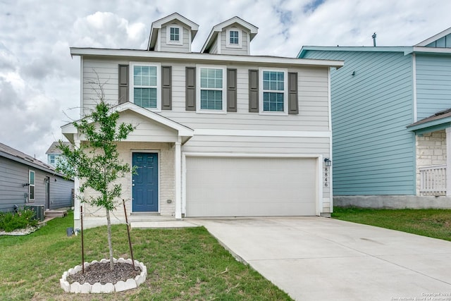 view of front of property with cooling unit, a garage, and a front lawn