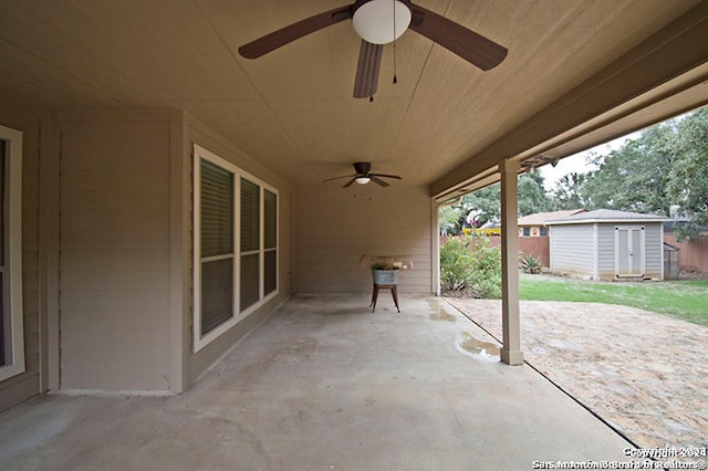 view of patio / terrace with a storage unit and ceiling fan