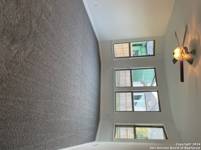 interior space with high vaulted ceiling and plenty of natural light