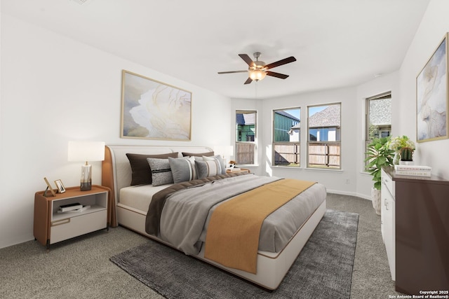 bedroom featuring carpet floors, a ceiling fan, and baseboards