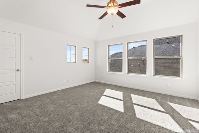 unfurnished room with carpet floors, ceiling fan, baseboards, and lofted ceiling