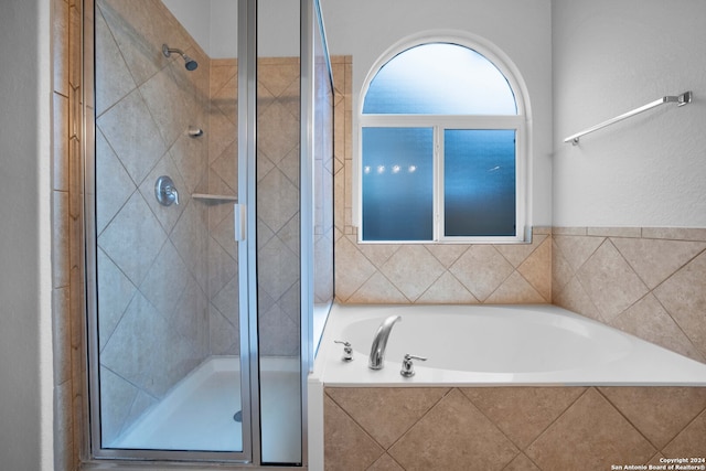 bathroom with plus walk in shower