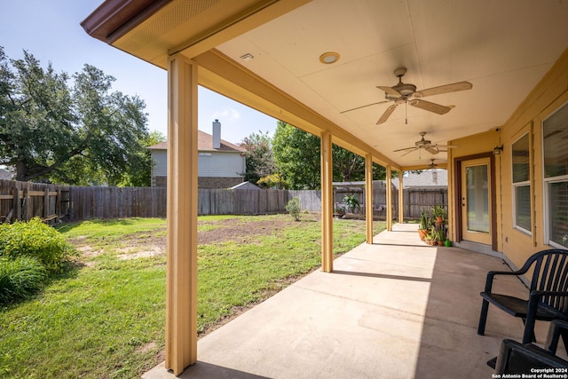 view of patio featuring ceiling fan