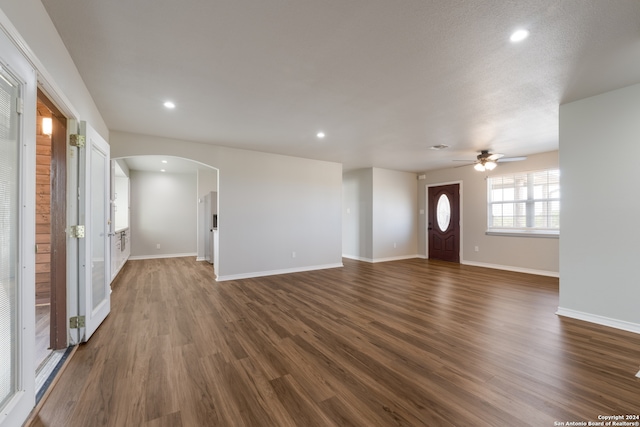 foyer featuring dark hardwood / wood-style floors and ceiling fan