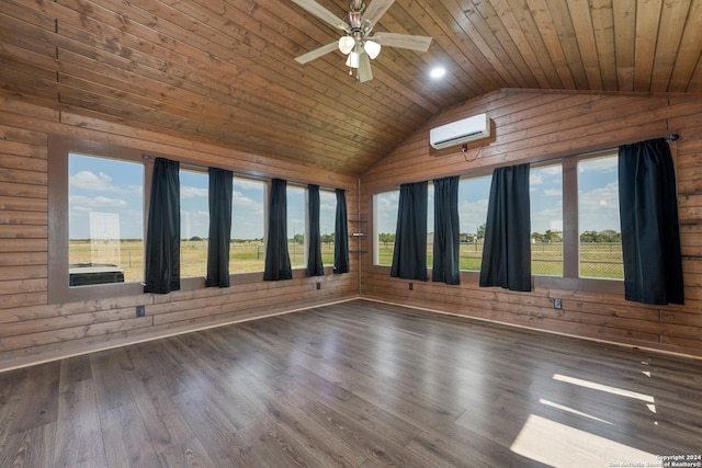 10886 Macaway Rd, Adkins, TX 78101 - spare room with vaulted ceiling, a wall mounted air conditioner, a ceiling fan, wood walls, and wood ceiling