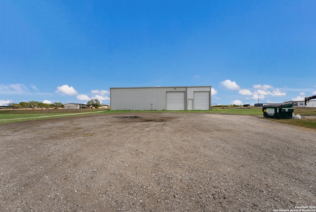 view of outbuilding with a garage