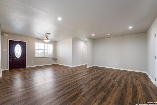10886 Macaway Rd, Adkins, TX 78101 - entrance foyer with dark wood-style floors, ceiling fan, baseboards, and recessed lighting