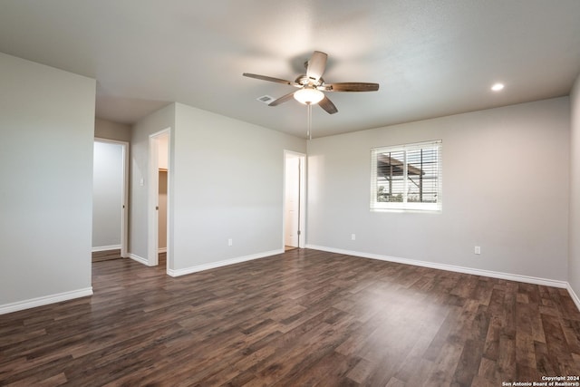 10886 Macaway Rd, Adkins, TX 78101 - empty room with a ceiling fan, dark wood-style floors, baseboards, and recessed lighting