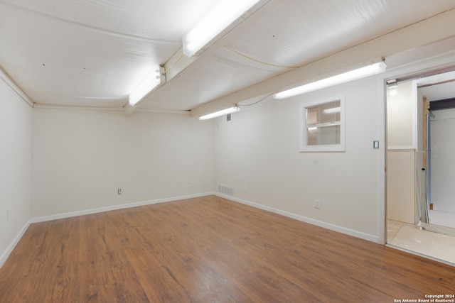 10886 Macaway Rd, Adkins, TX 78101 - finished below grade area featuring wood finished floors and baseboards