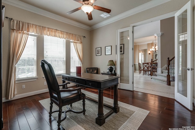 office space featuring dark wood-type flooring, ceiling fan with notable chandelier, french doors, and ornamental molding