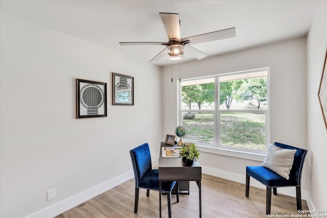 office area featuring light wood-type flooring and ceiling fan