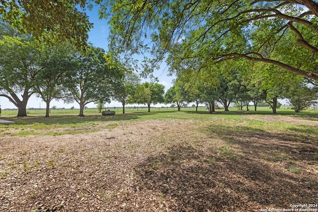 exterior space with a rural view